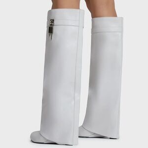 White fold over boots.  Lock detail.  Wedge heel. Size 10.  Fits wide calf.